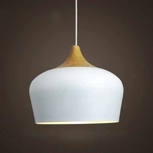 Metal and wood pendant lights in delicate pastel tones