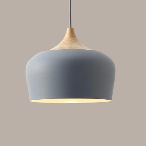 Metal and wood pendant lights in delicate pastel tones